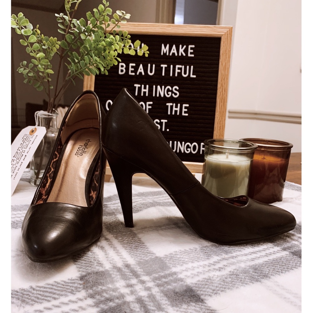 Black leather pumps